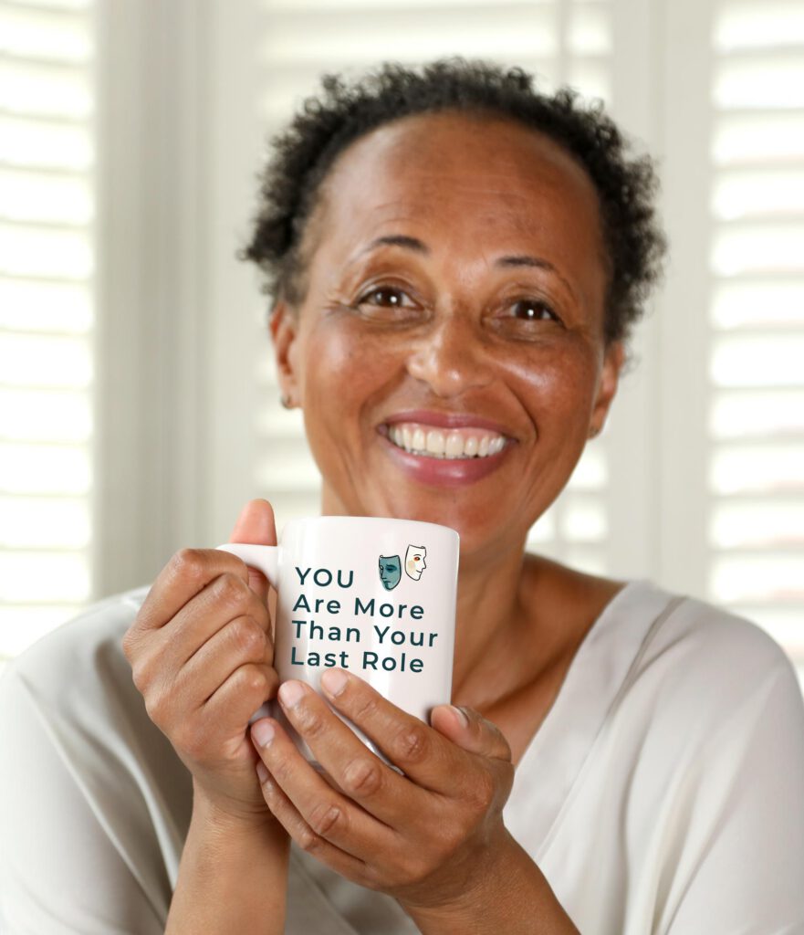 Corinne Delacour bilingual career coach London holding a mug